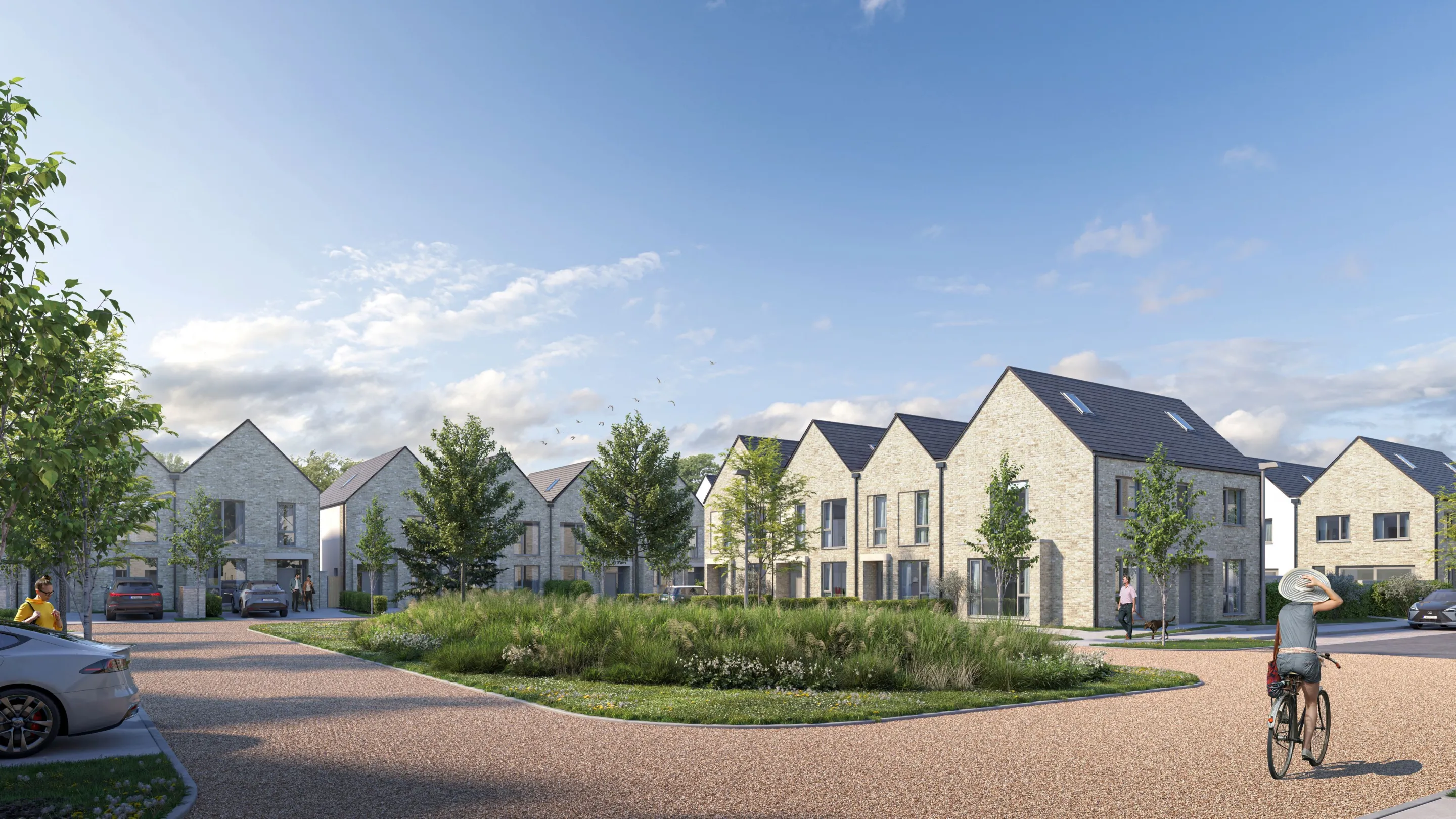 A courtyard with terraced houses and a landscaped 'green' area