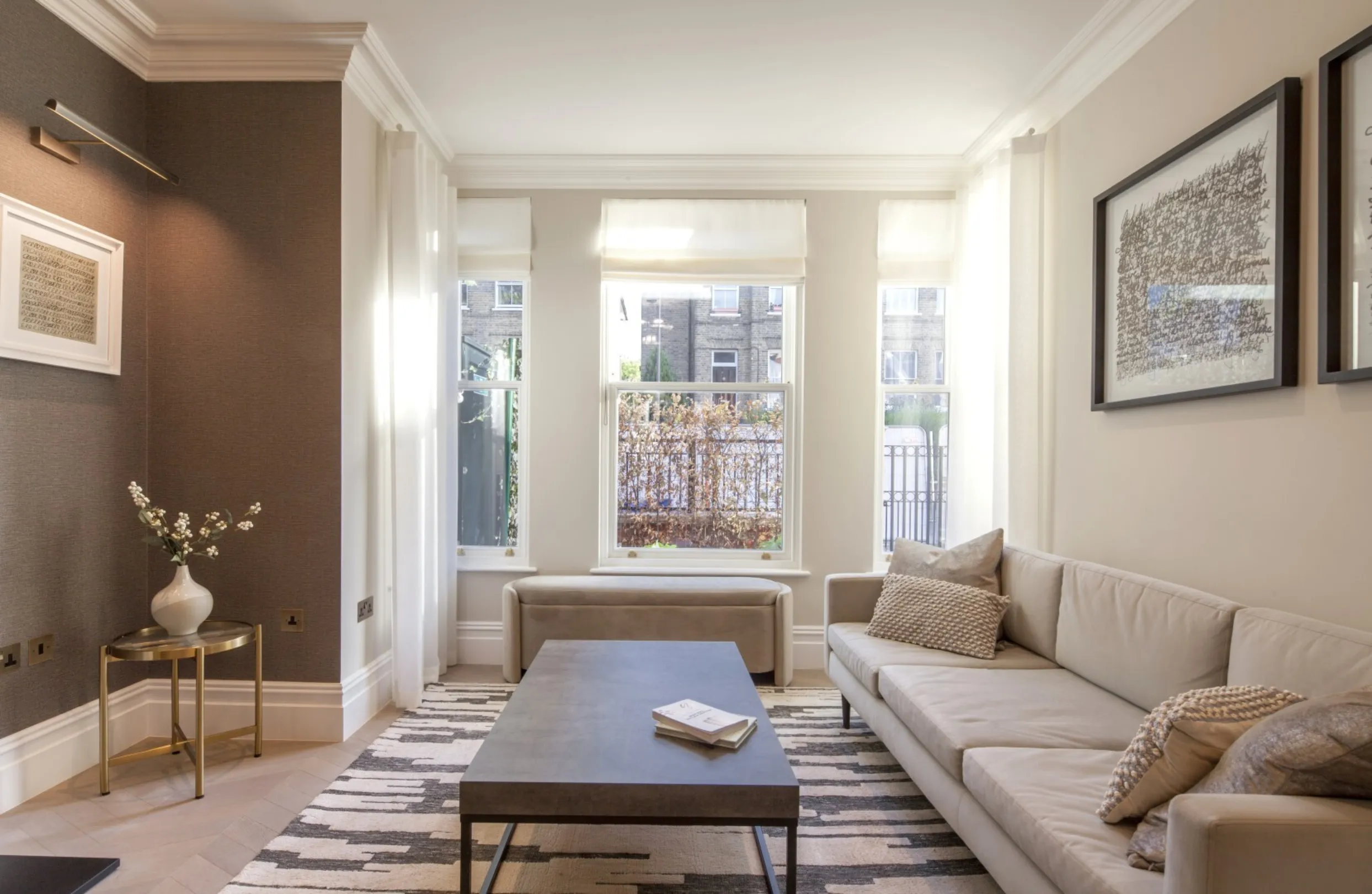 Reception room (bay window): Bright sash windows and a tailored palette make this a light-filled space to unwind.