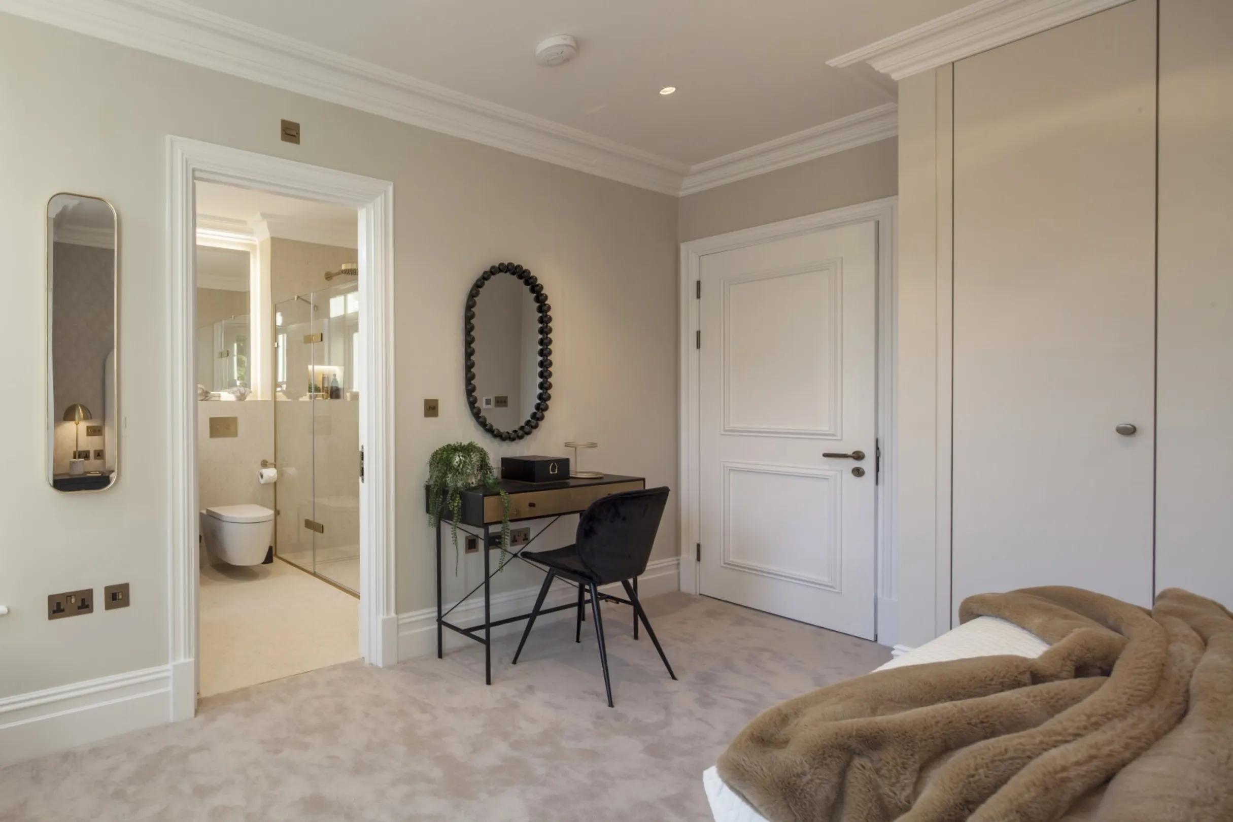 Second bedroom (en suite view): A dressing area and en suite shower room complete this generous principal suite.