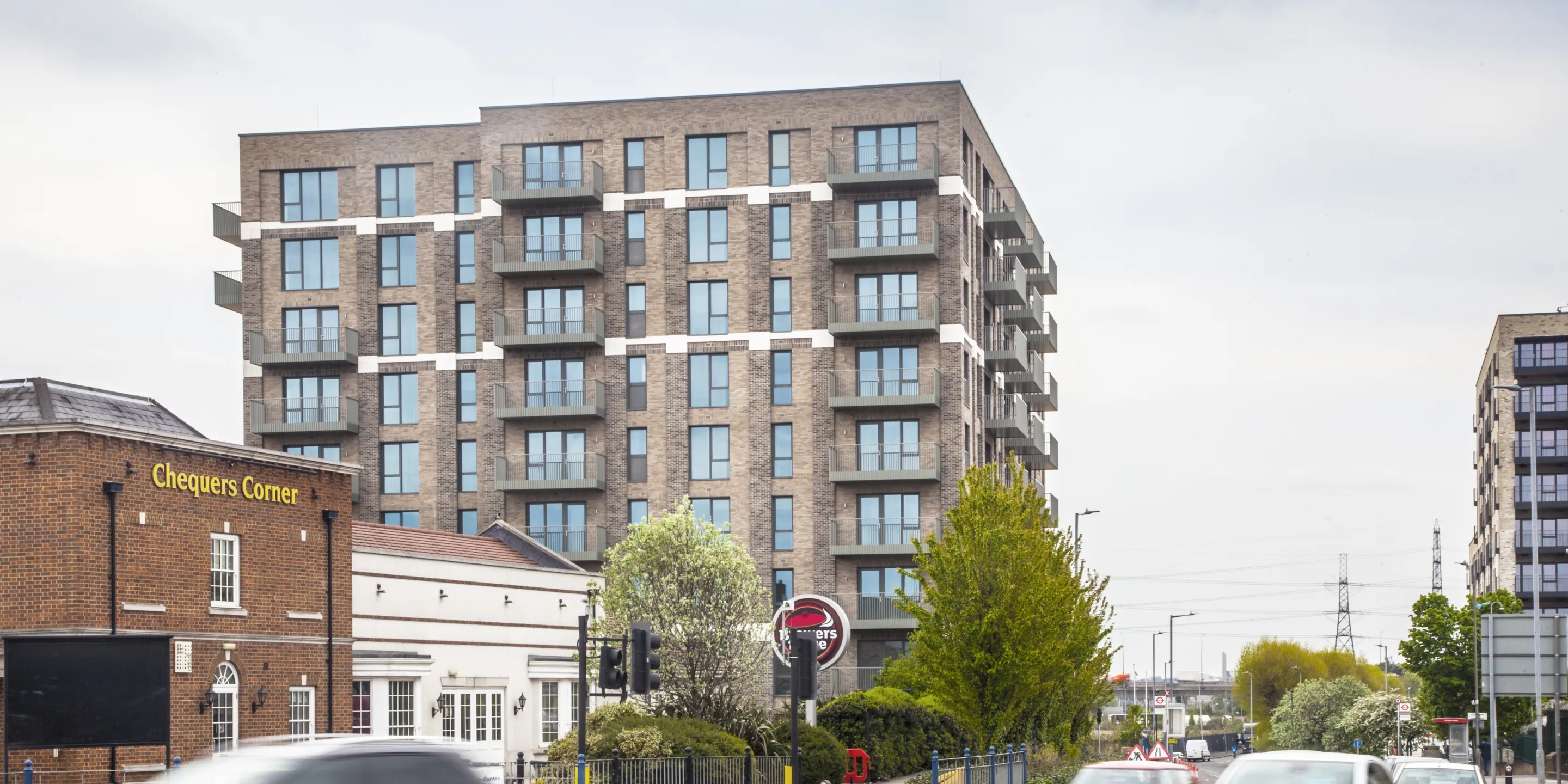 A 9-storey new development in Dagenham, with brick facades and stone banding