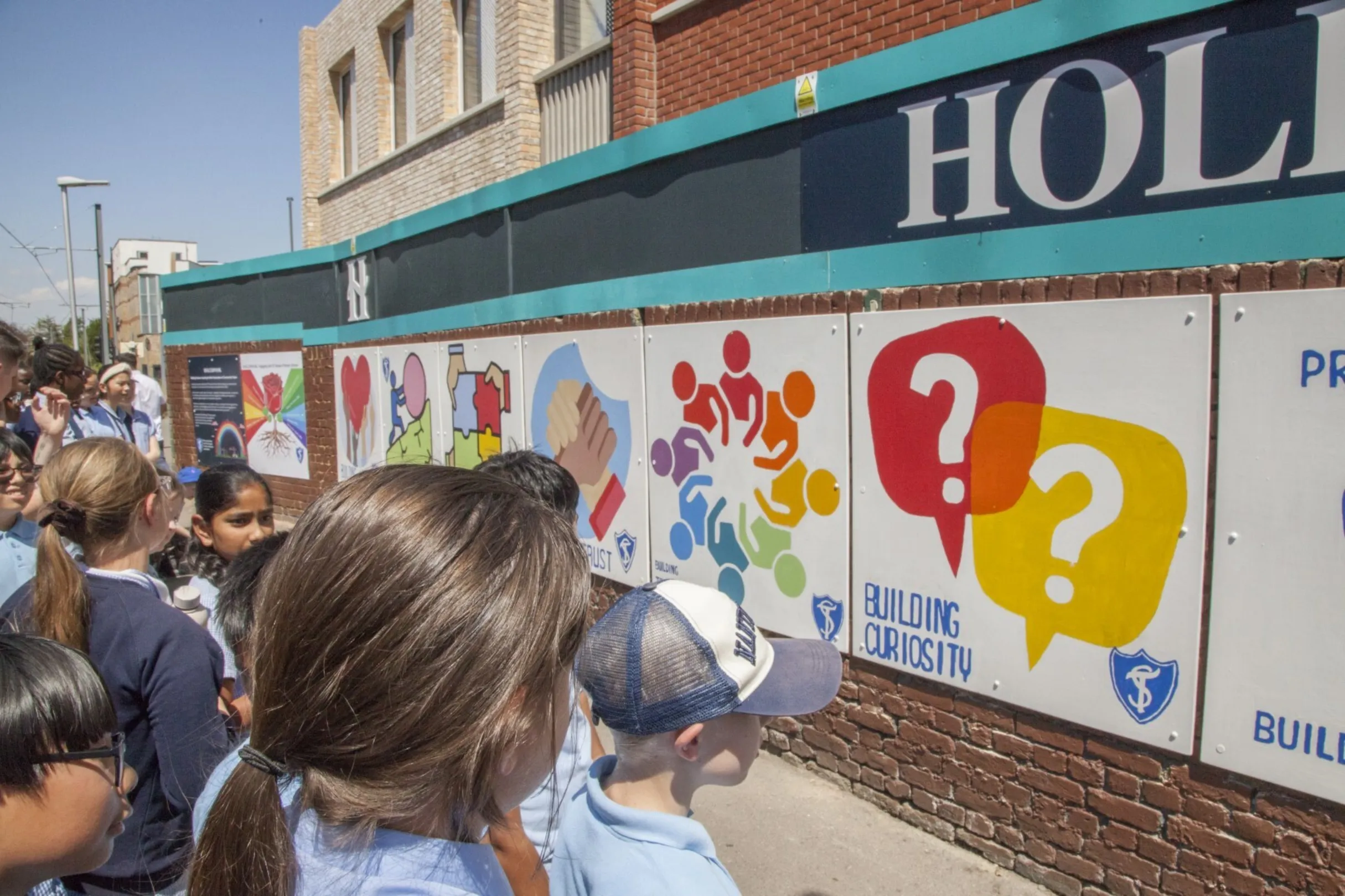 School children on a site visit to 144 Kingston Road