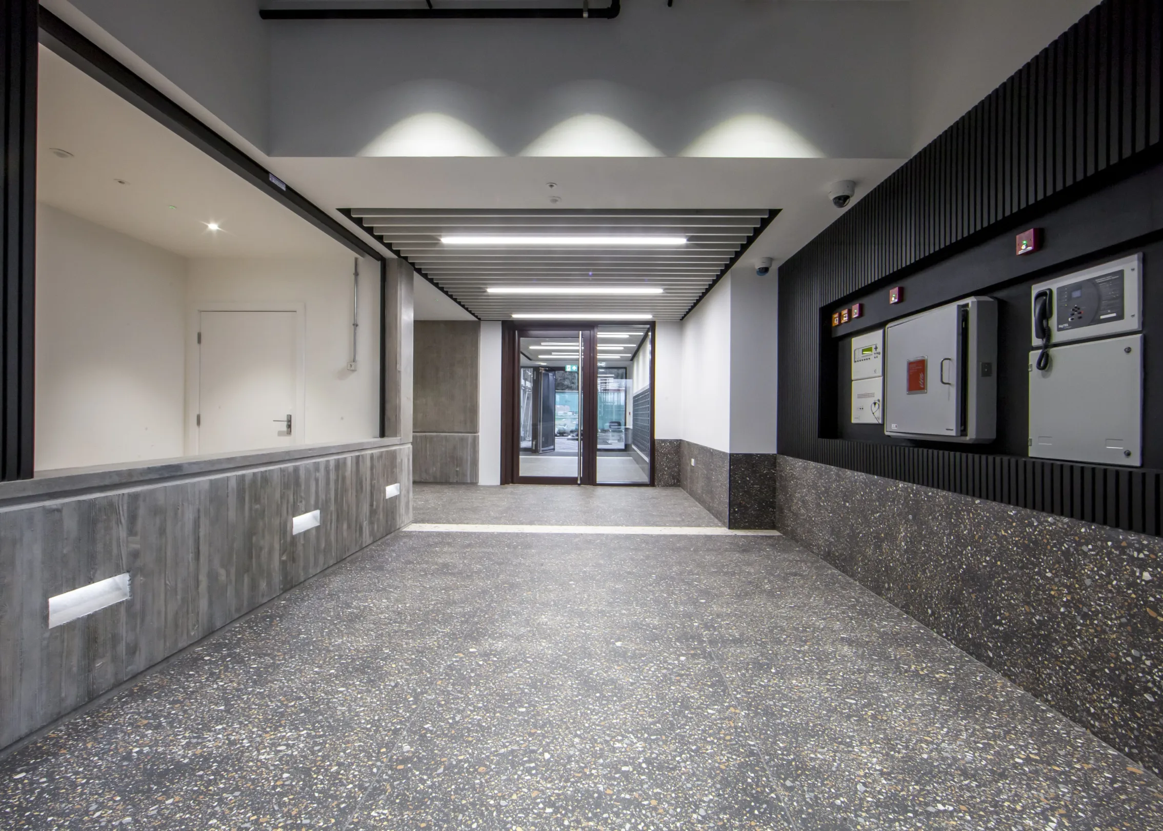 Ground floor detail of a modern residential building showing various architectural details.