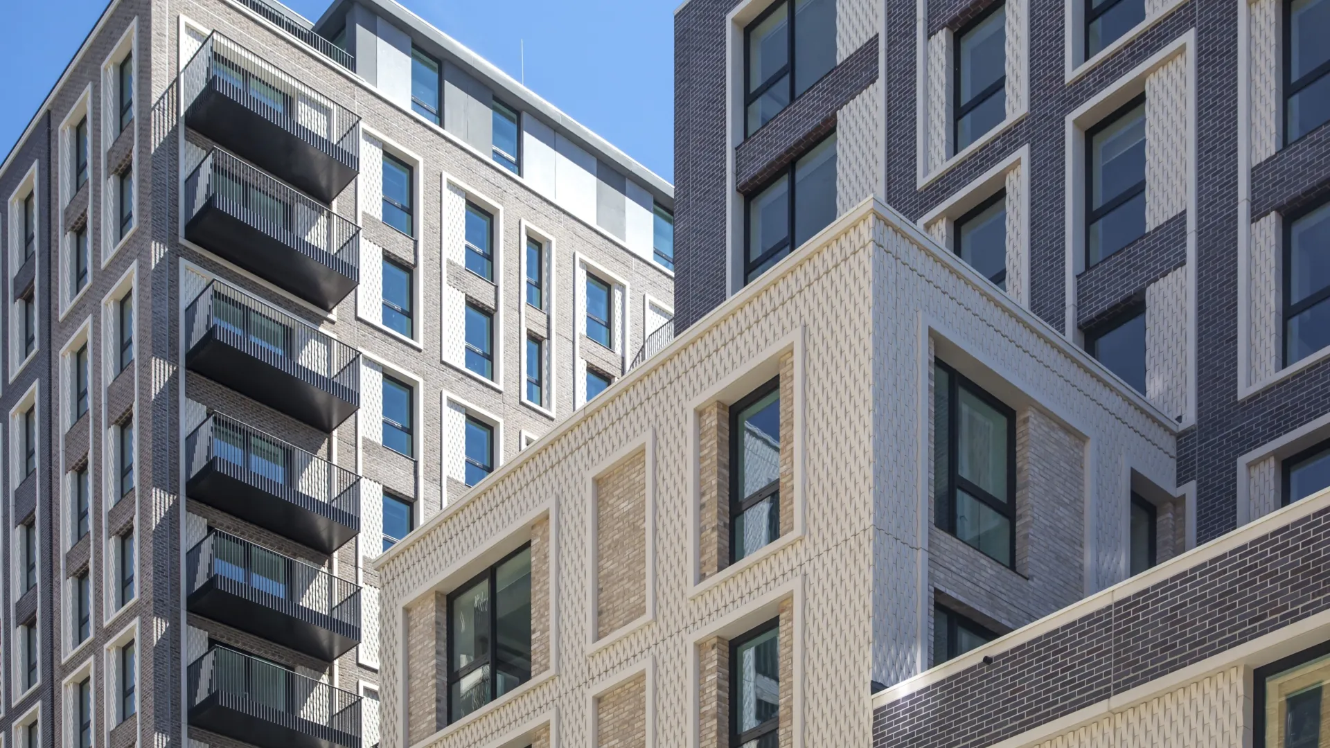 Looking up towards the top of residential buildings