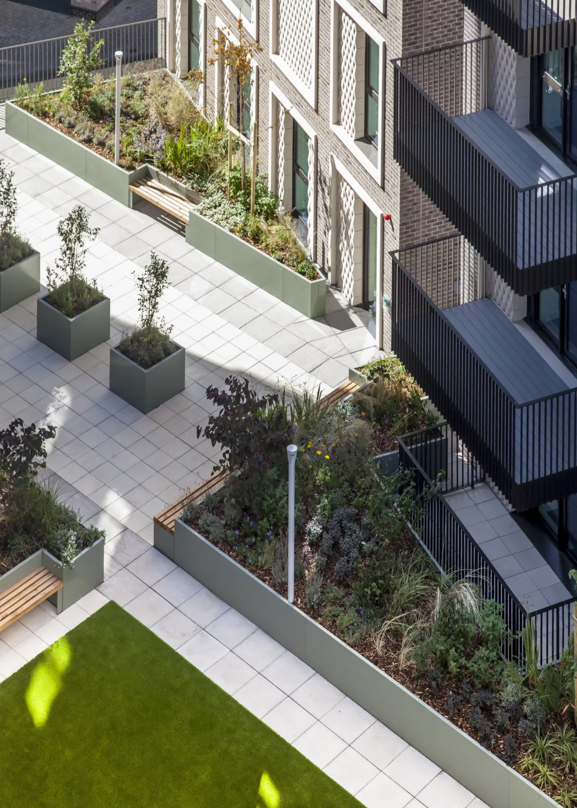 An aerial photograph of a lanscaped area of a new housing development in Wandsworth