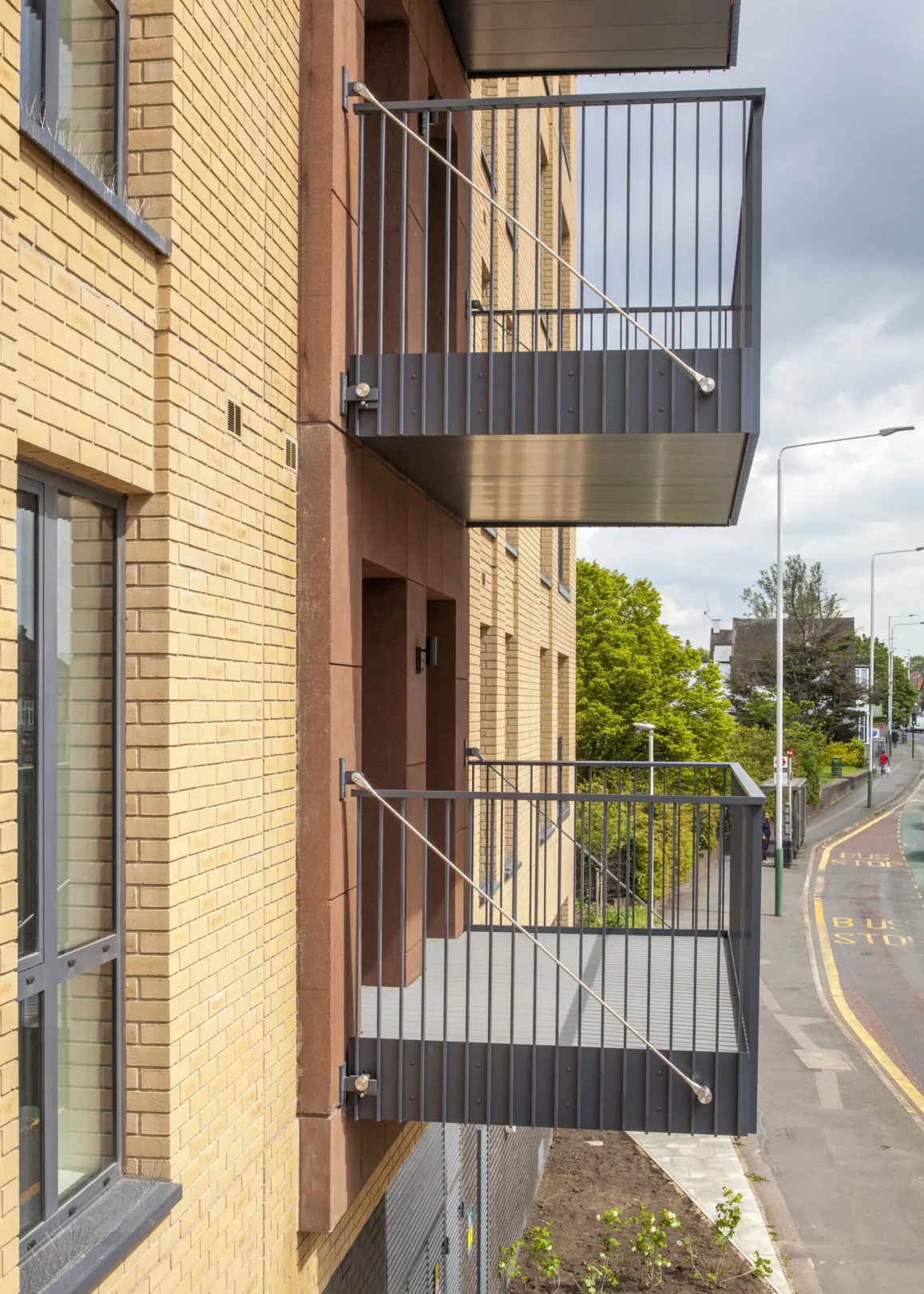 Architectural detail of two balconies on a modern residential building