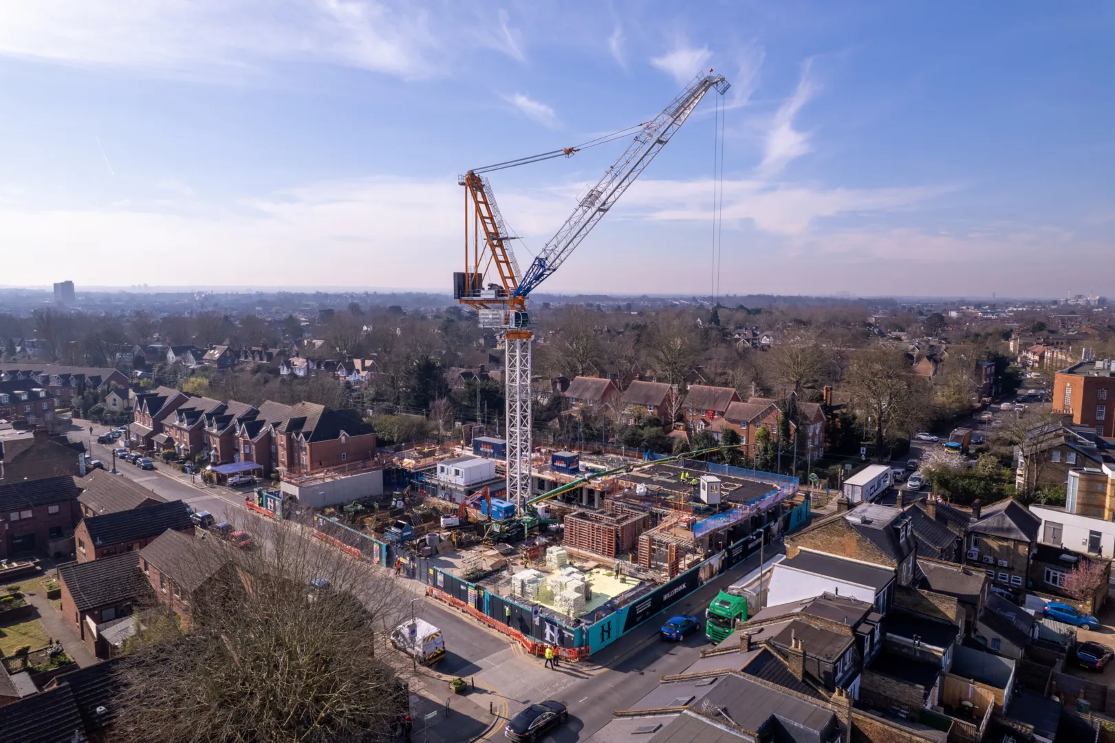Construction site in Wimbledon, concrete being poured to a first floor slab